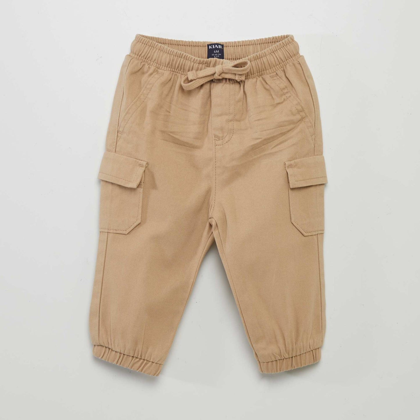 Pantalón jogger con bolsillos con solapa BEIGE