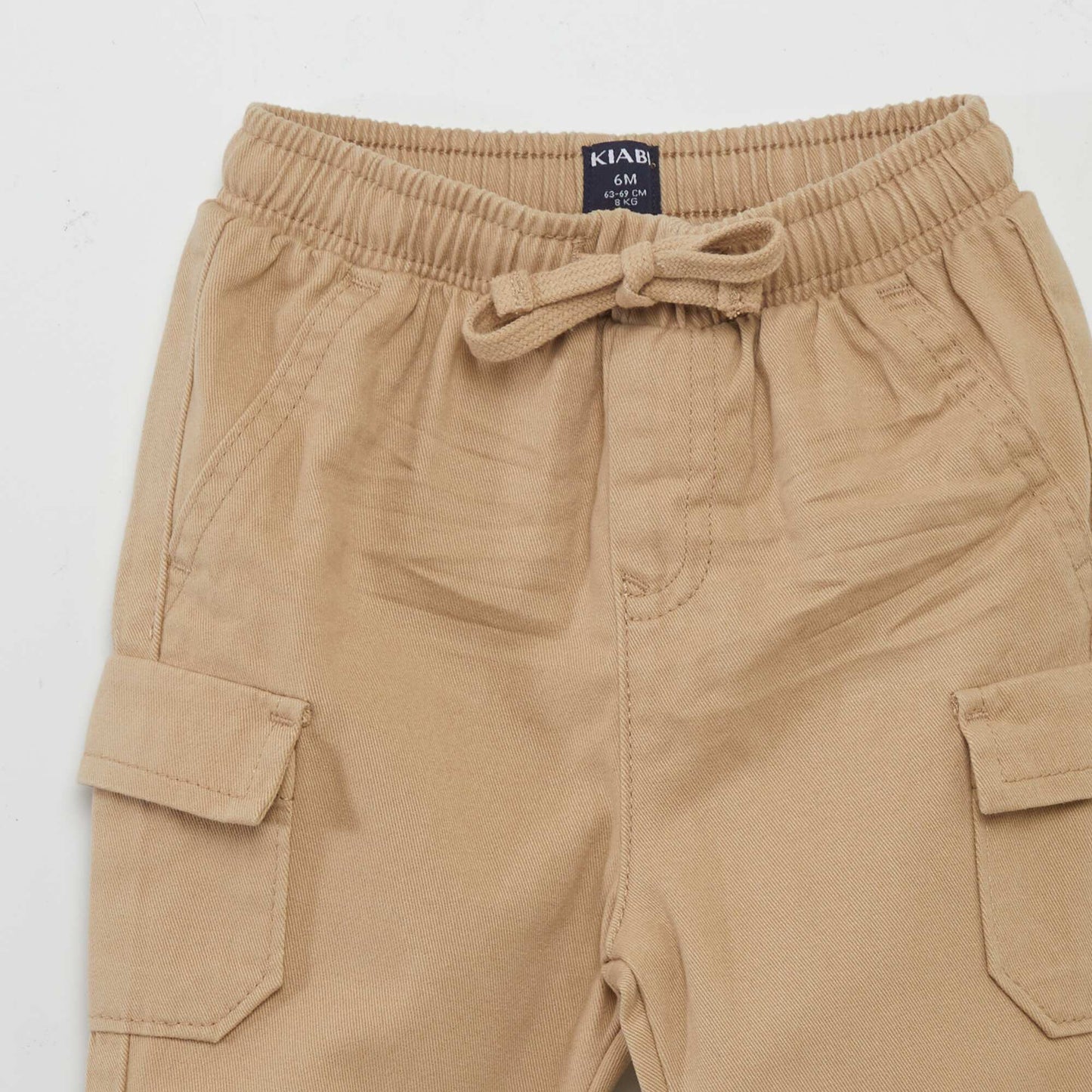 Pantalón jogger con bolsillos con solapa BEIGE
