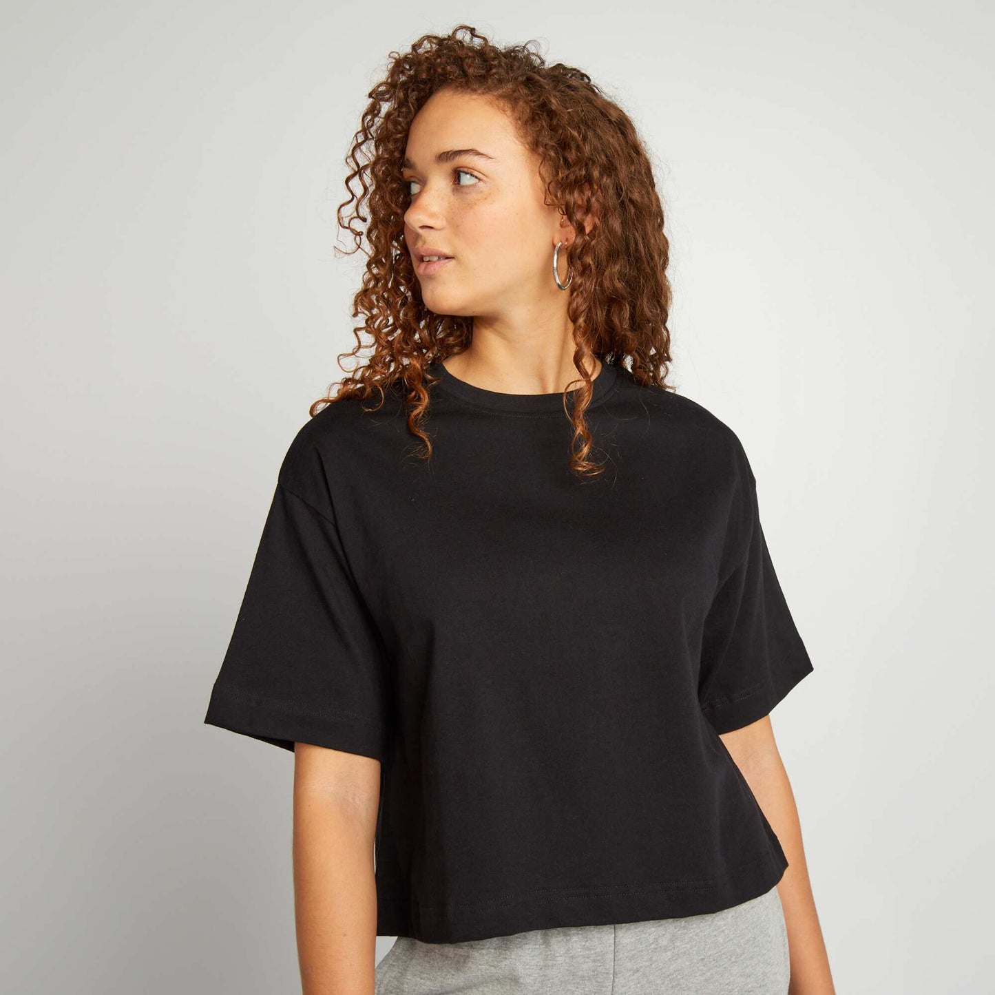 Camiseta ancha cropped negro