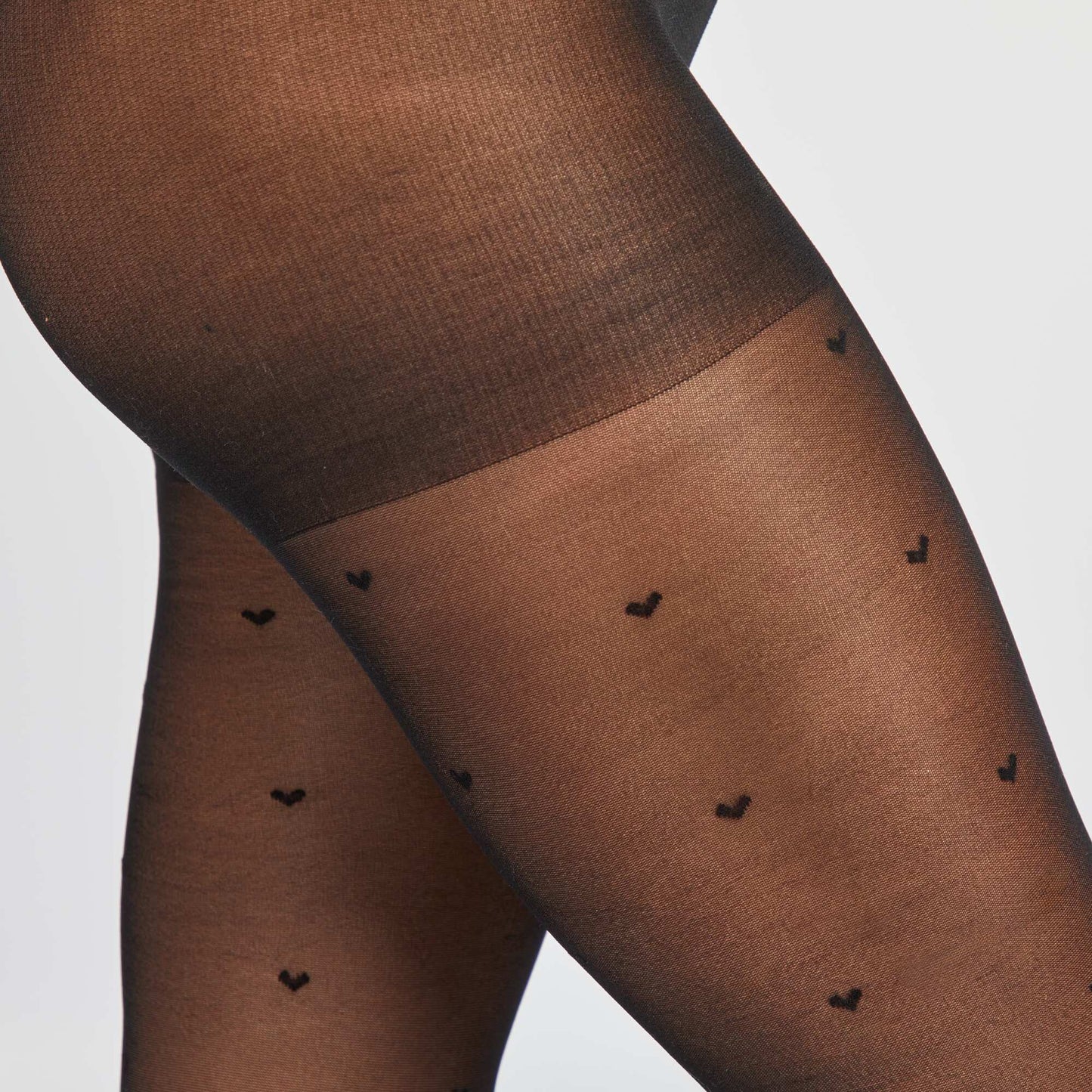 Medias de plumeti con corazón negro