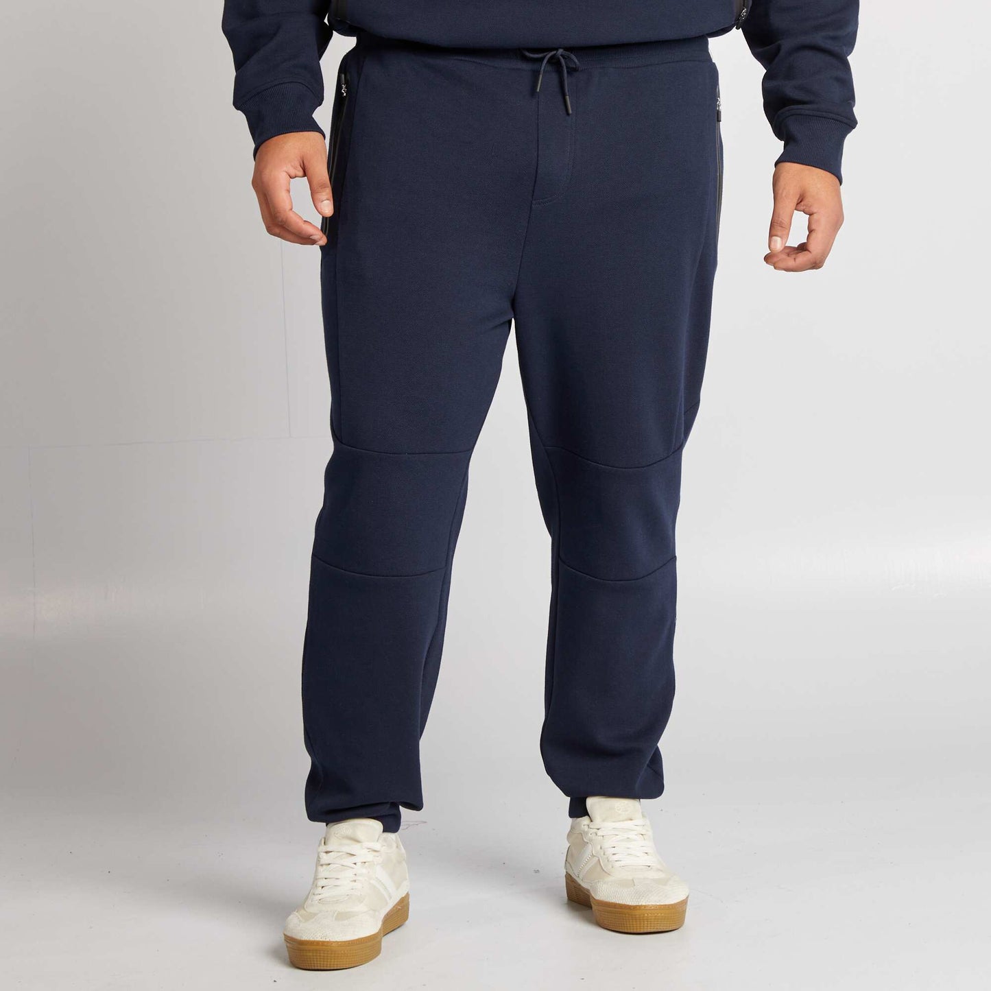 Pantalón de chándal de punto de piqué con bolsillos con cremallera AZUL