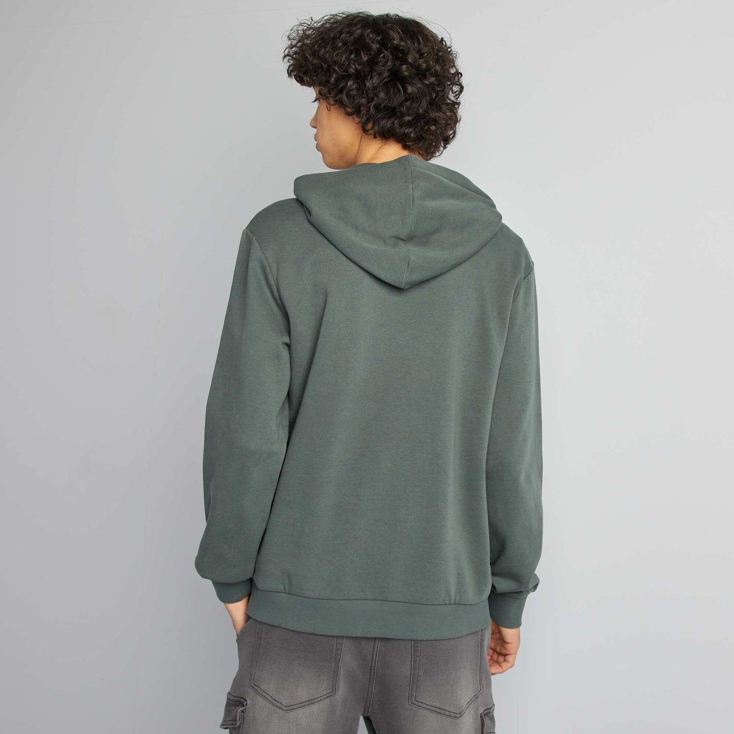 Buzo con capucha y mensaje VERDE