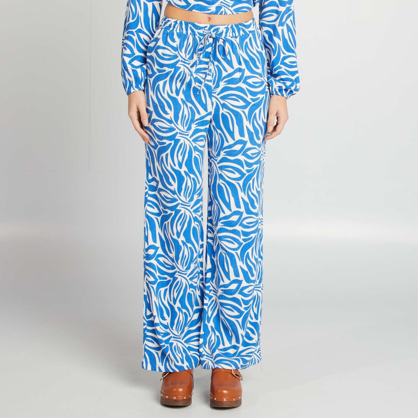 Pantalón ancho con estampado BEIGE