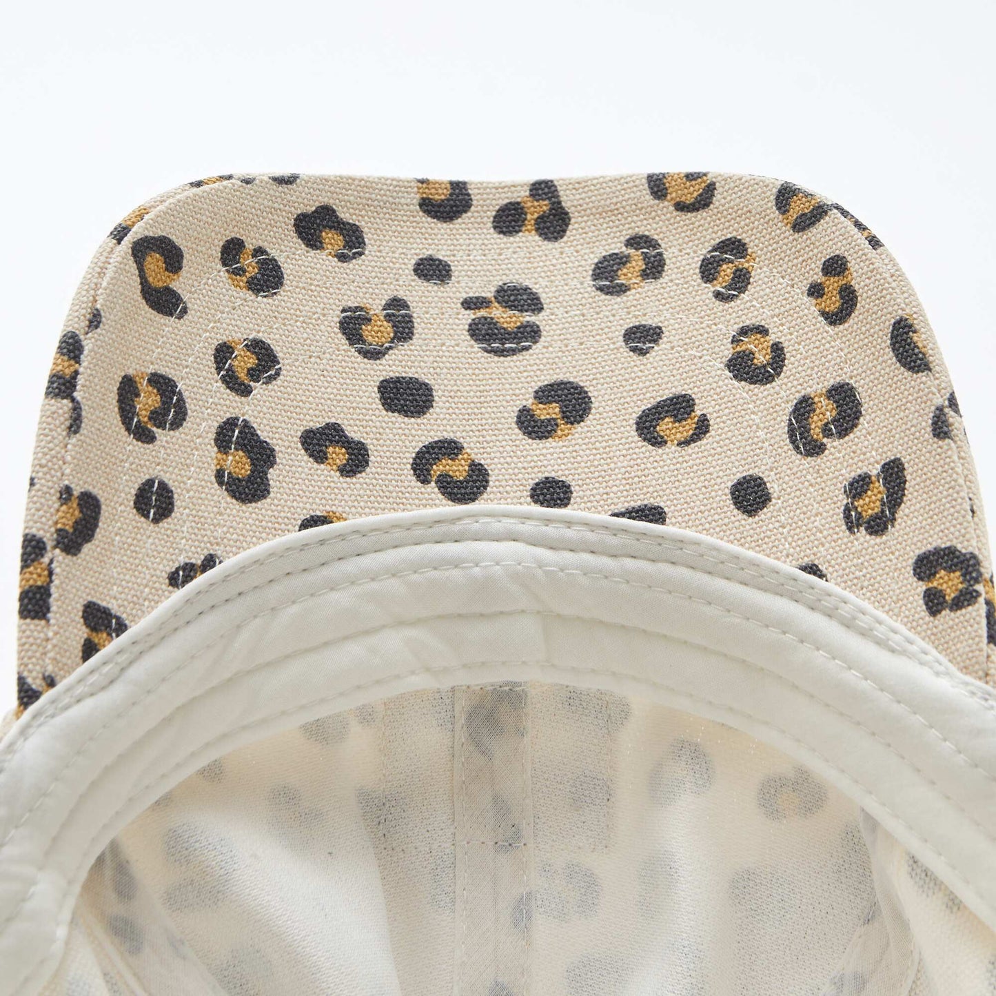 Gorra de tela con estampado BEIGE
