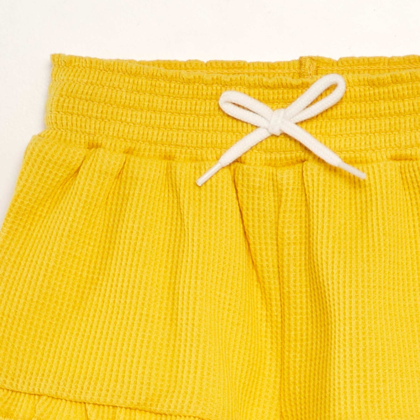 Short de nido de abeja AMARILLO