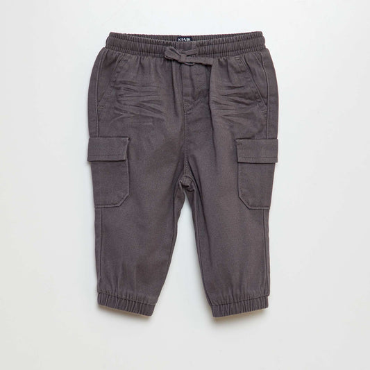 Pantalón jogger con bolsillos con solapa GRIS