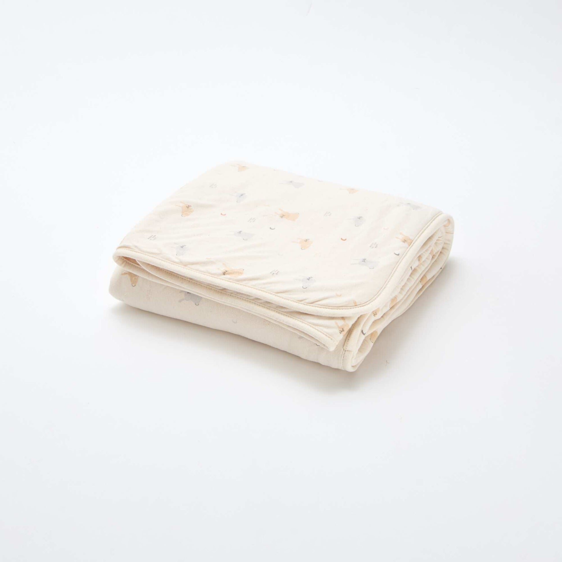 Manta estampada con interior de tejido polar BEIGE