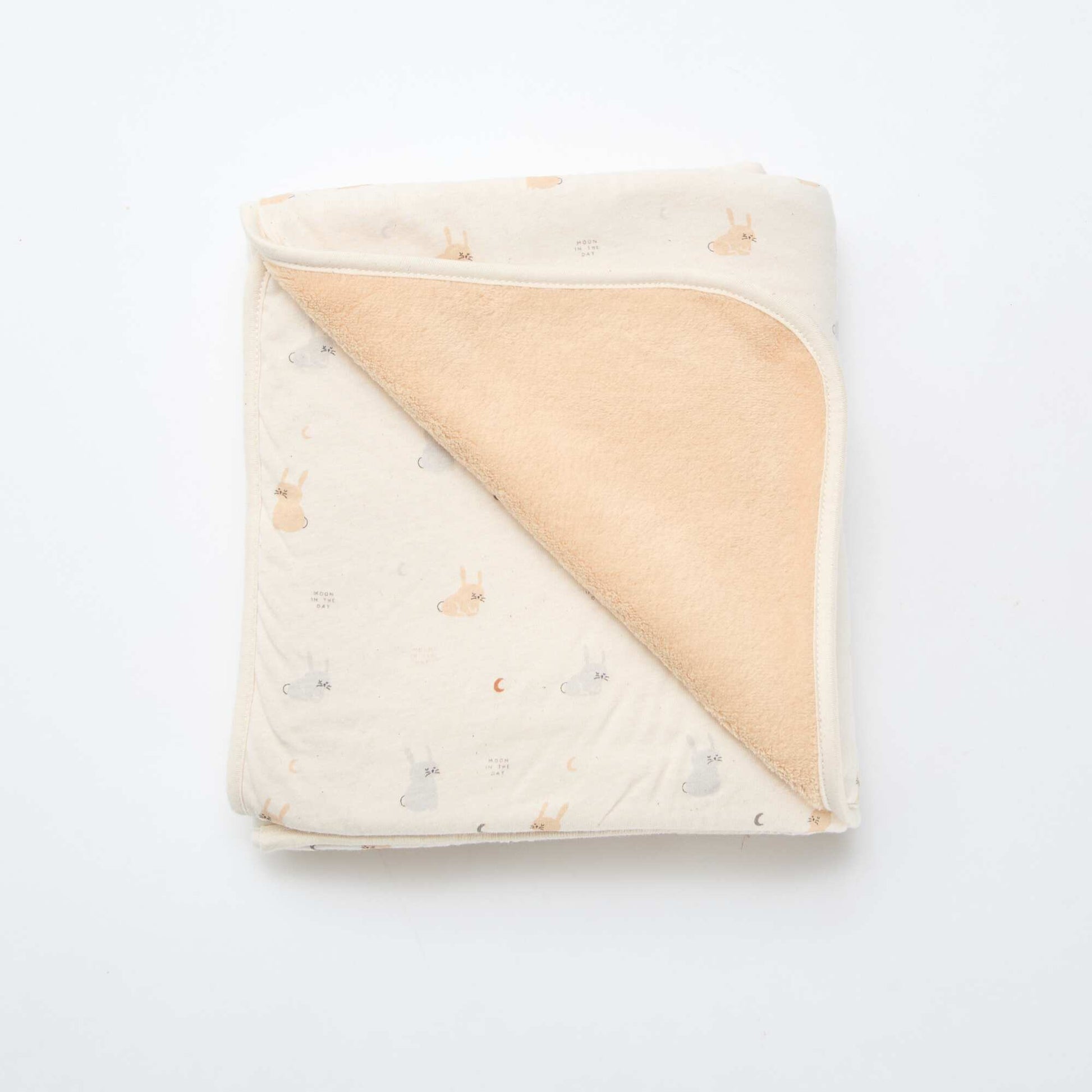 Manta estampada con interior de tejido polar BEIGE