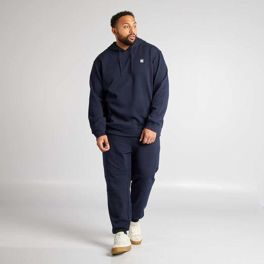 Pantalón de chándal de punto de piqué con bolsillos con cremallera AZUL