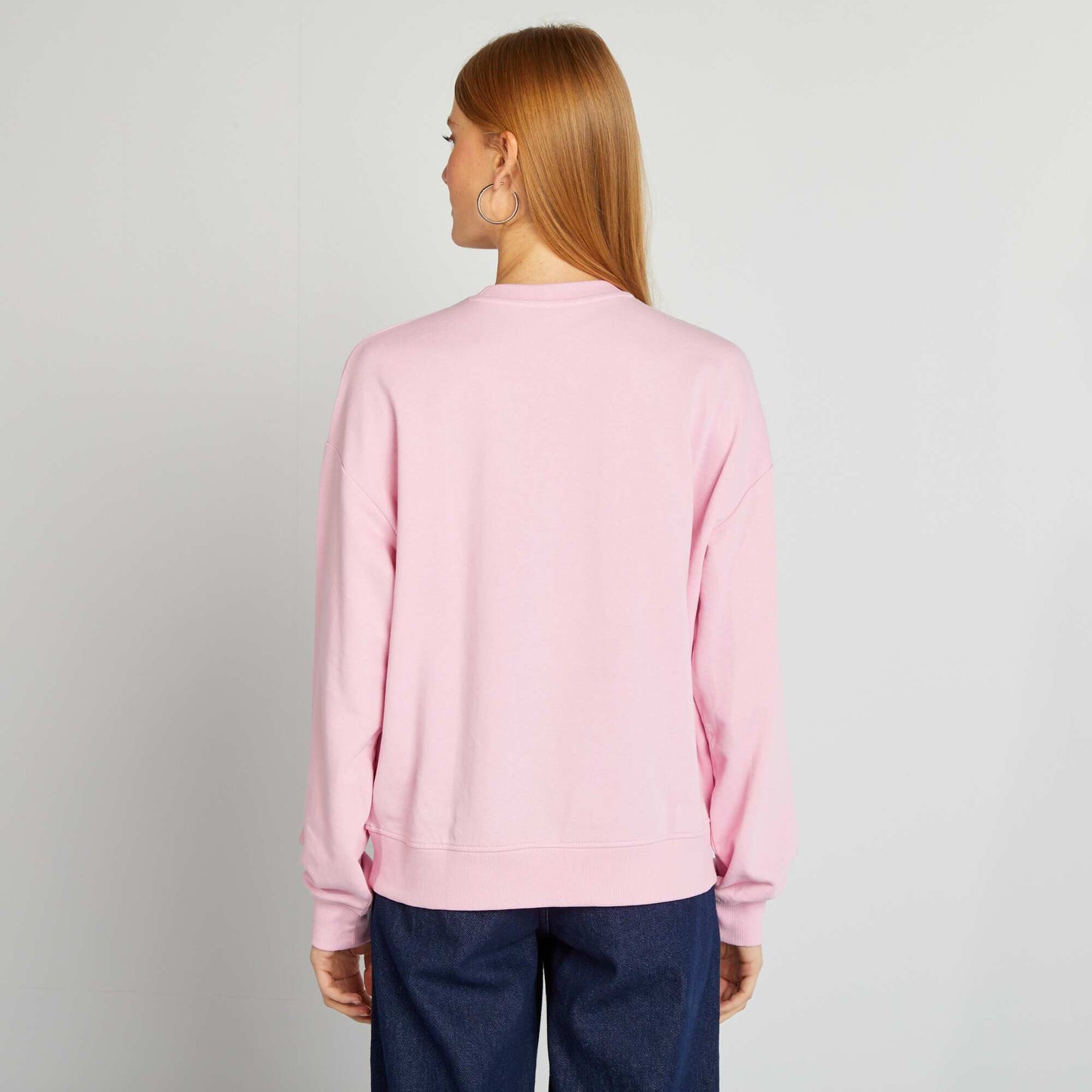 Buzo estampada con cuello redondo ROSA