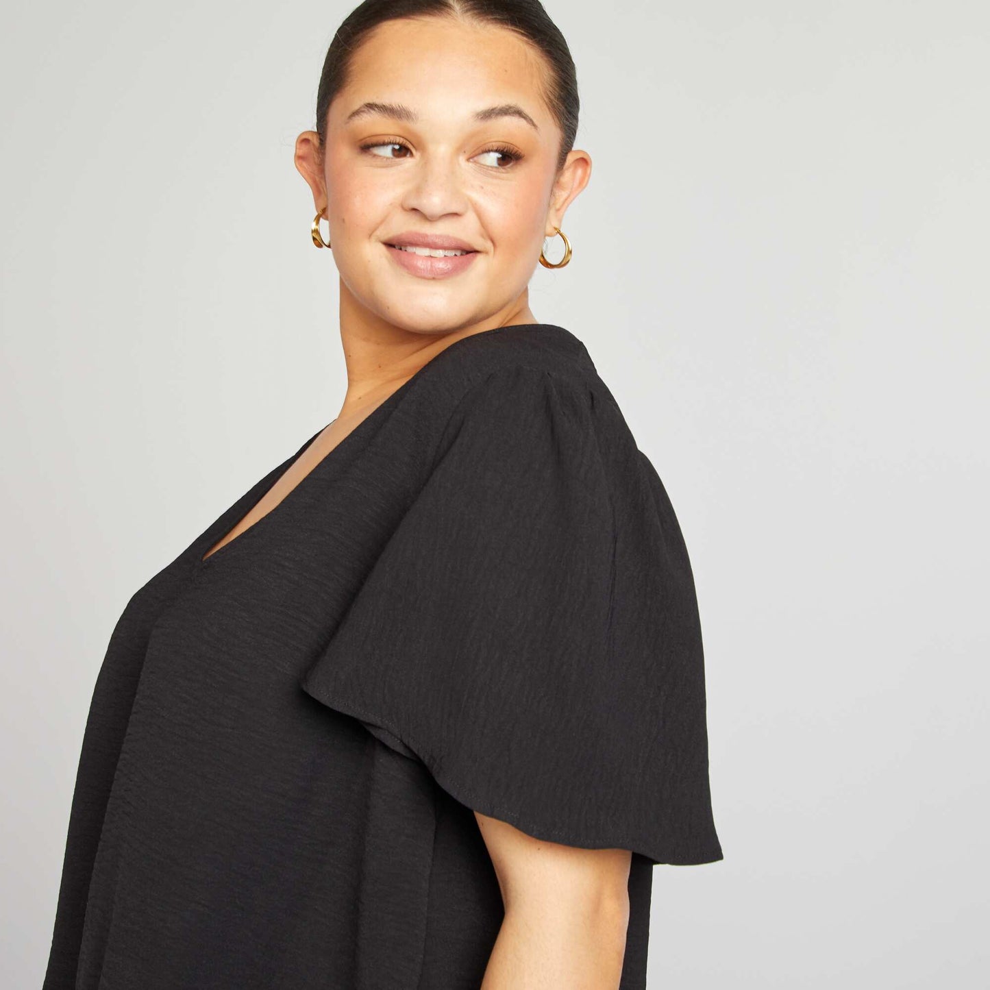 Blusa lisa de manga corta NEGRO