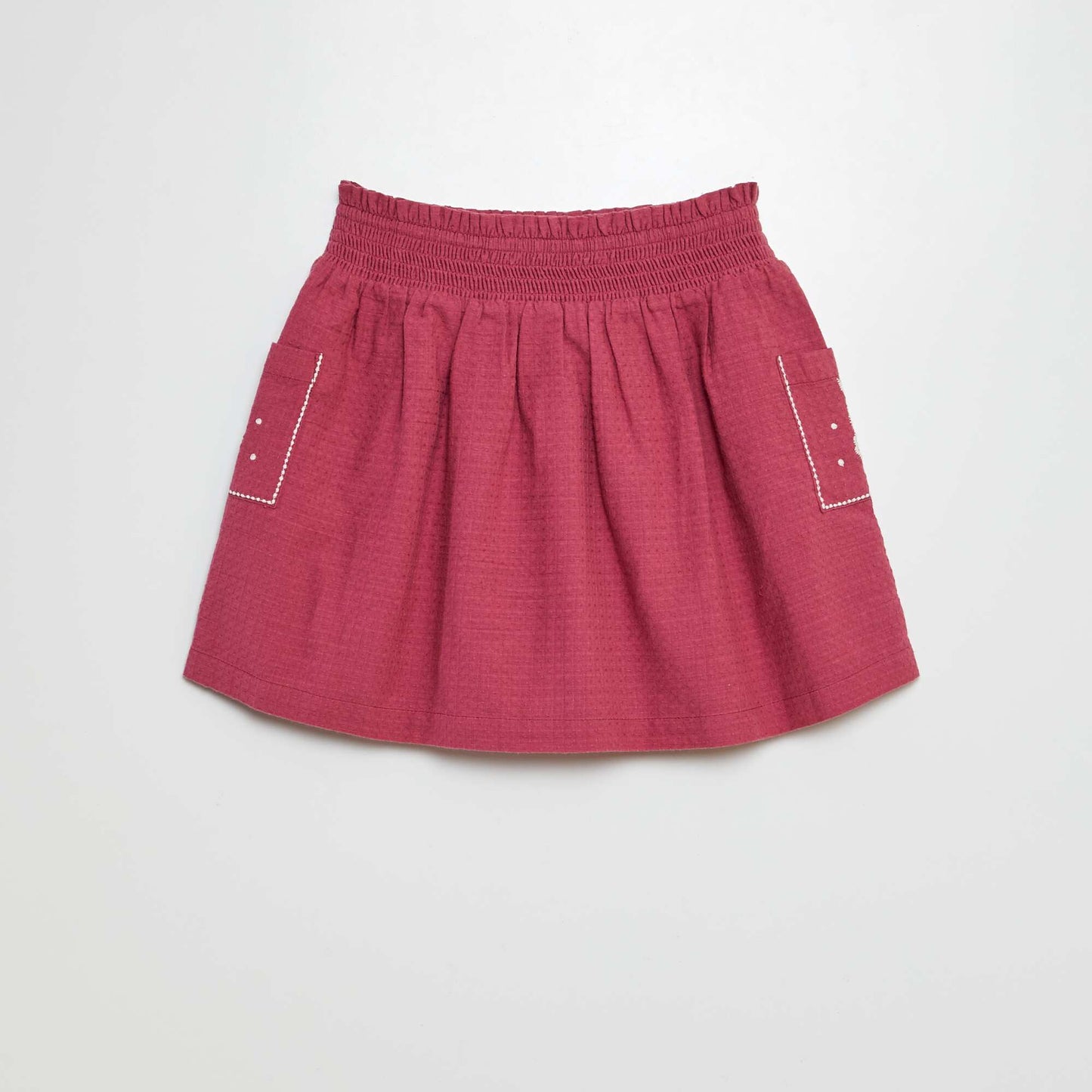 Falda corta evasé PURPURA