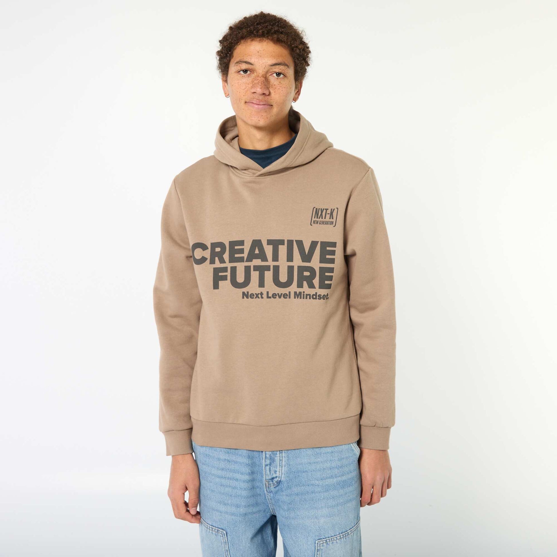 Buzo estampada con diseño fantasía en algodón liso BEIGE