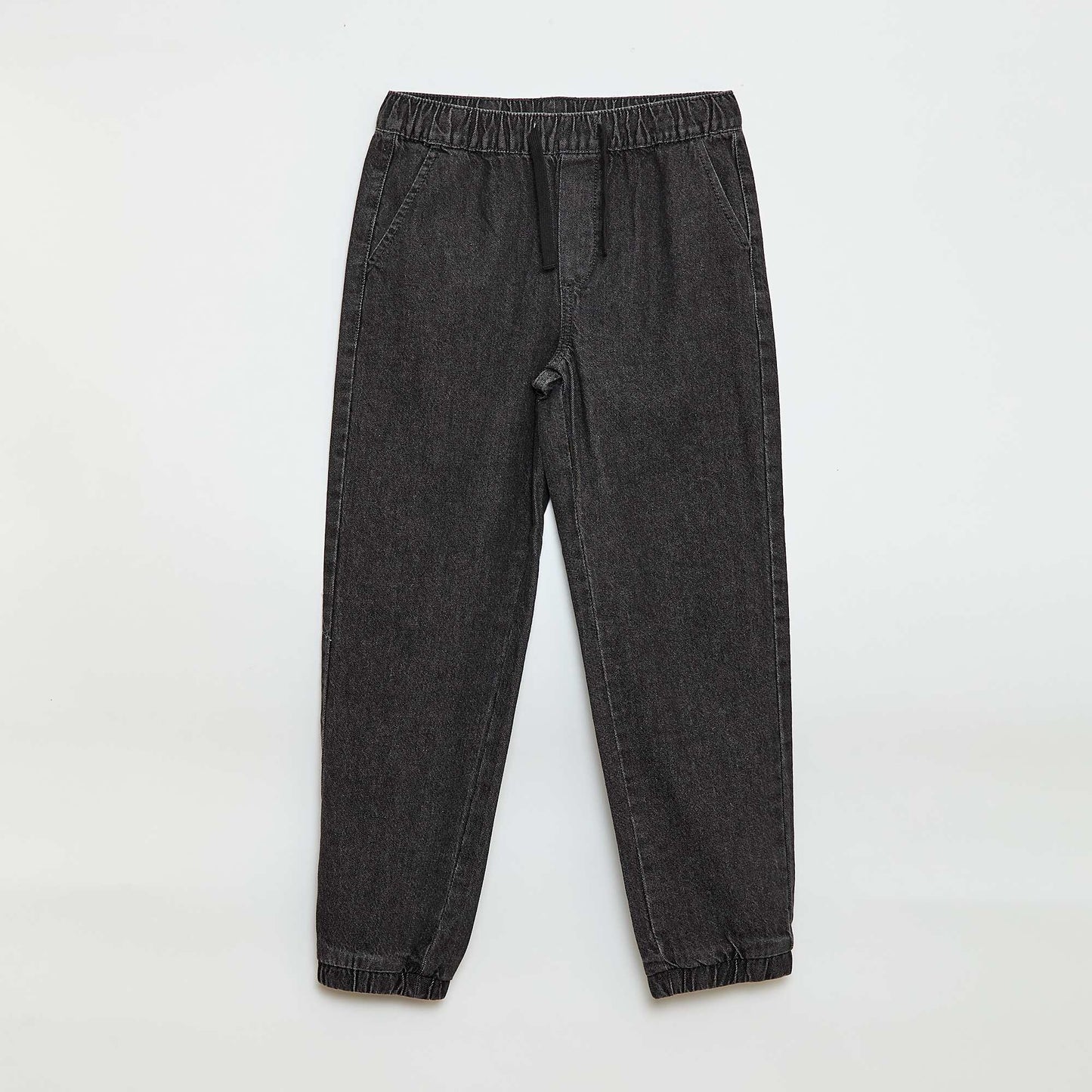 Pantalón denim corte jogger GRIS