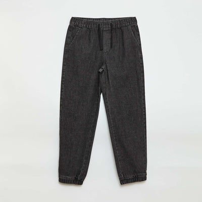 Pantalón denim corte jogger GRIS