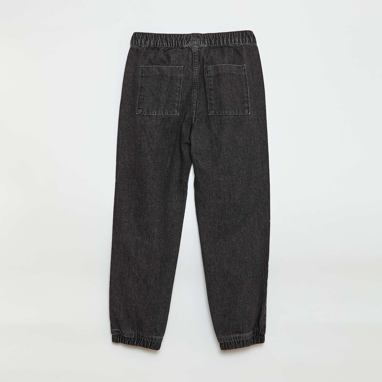 Pantalón denim corte jogger GRIS