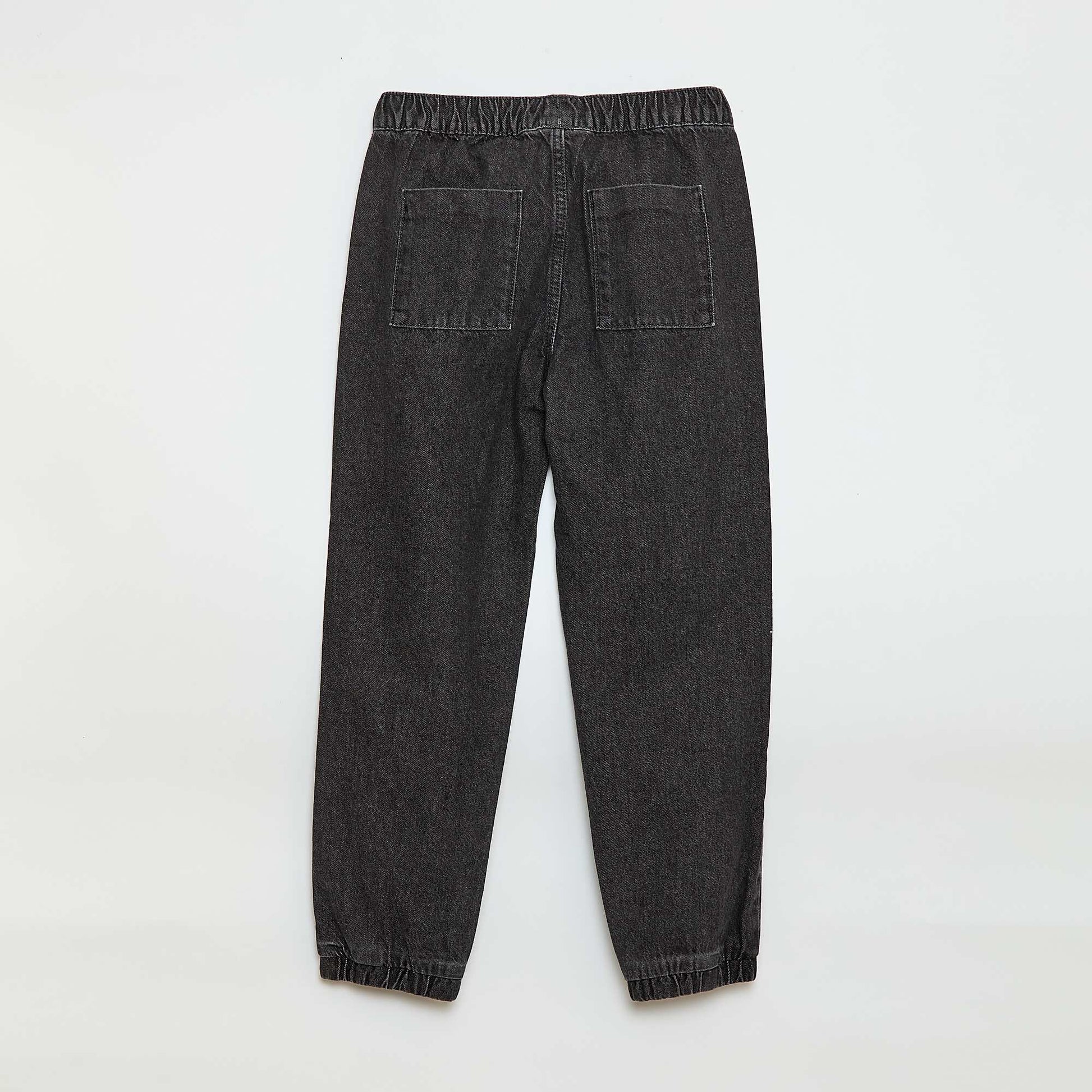 Pantalón denim corte jogger GRIS