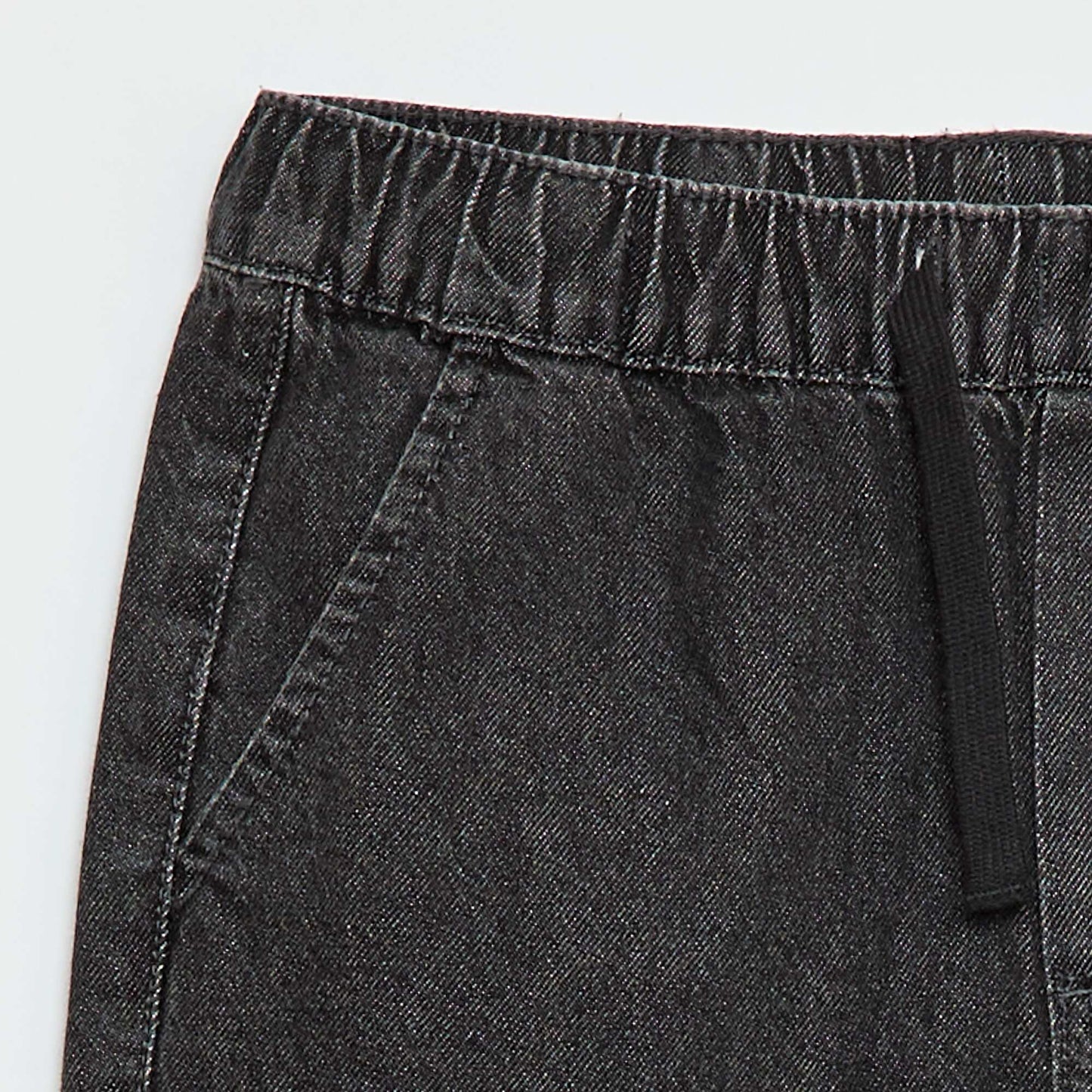 Pantalón denim corte jogger GRIS