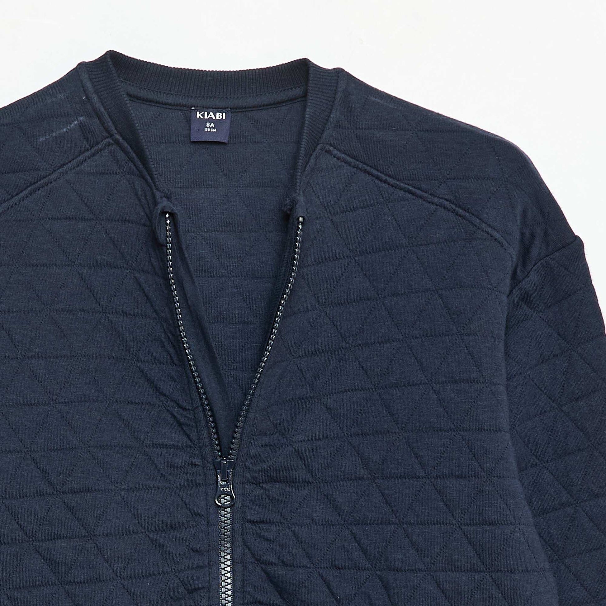 Buzo con cremallera y acolchada en algodón liso AZUL