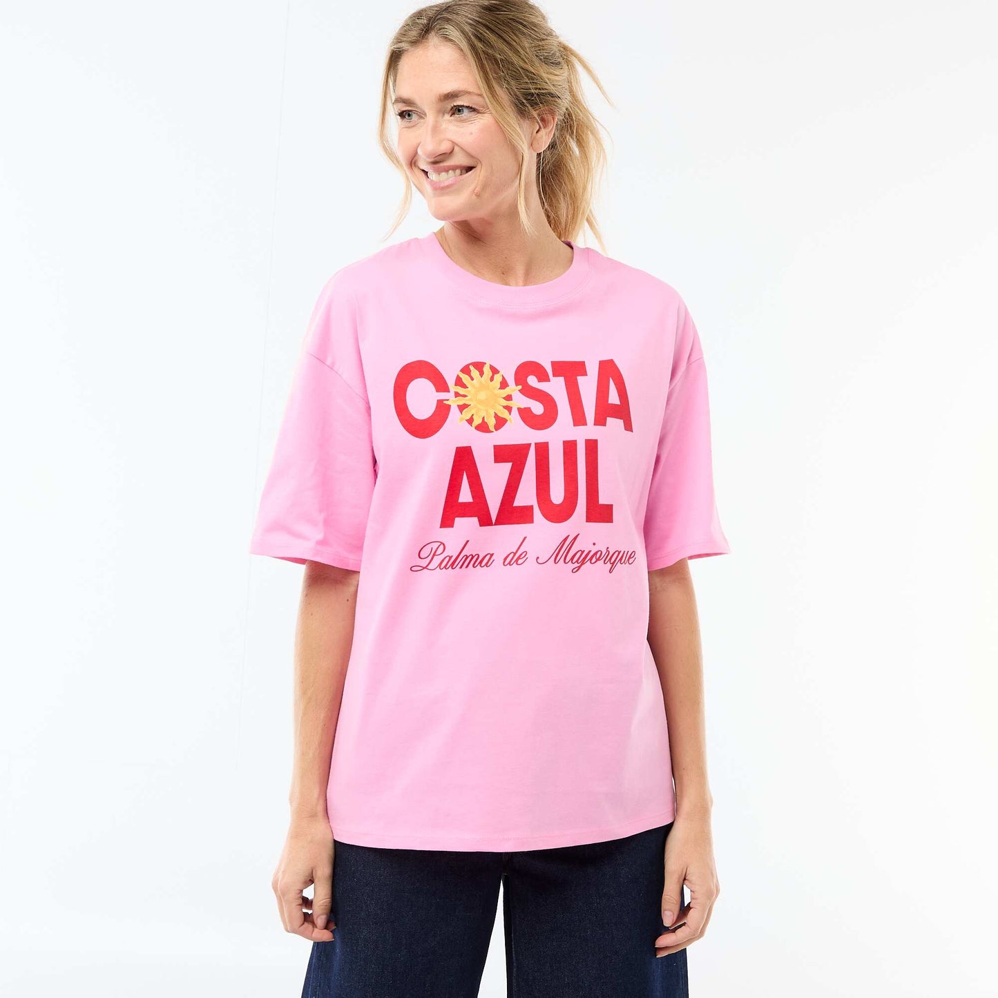 Camiseta oversize con mensaje ROSA