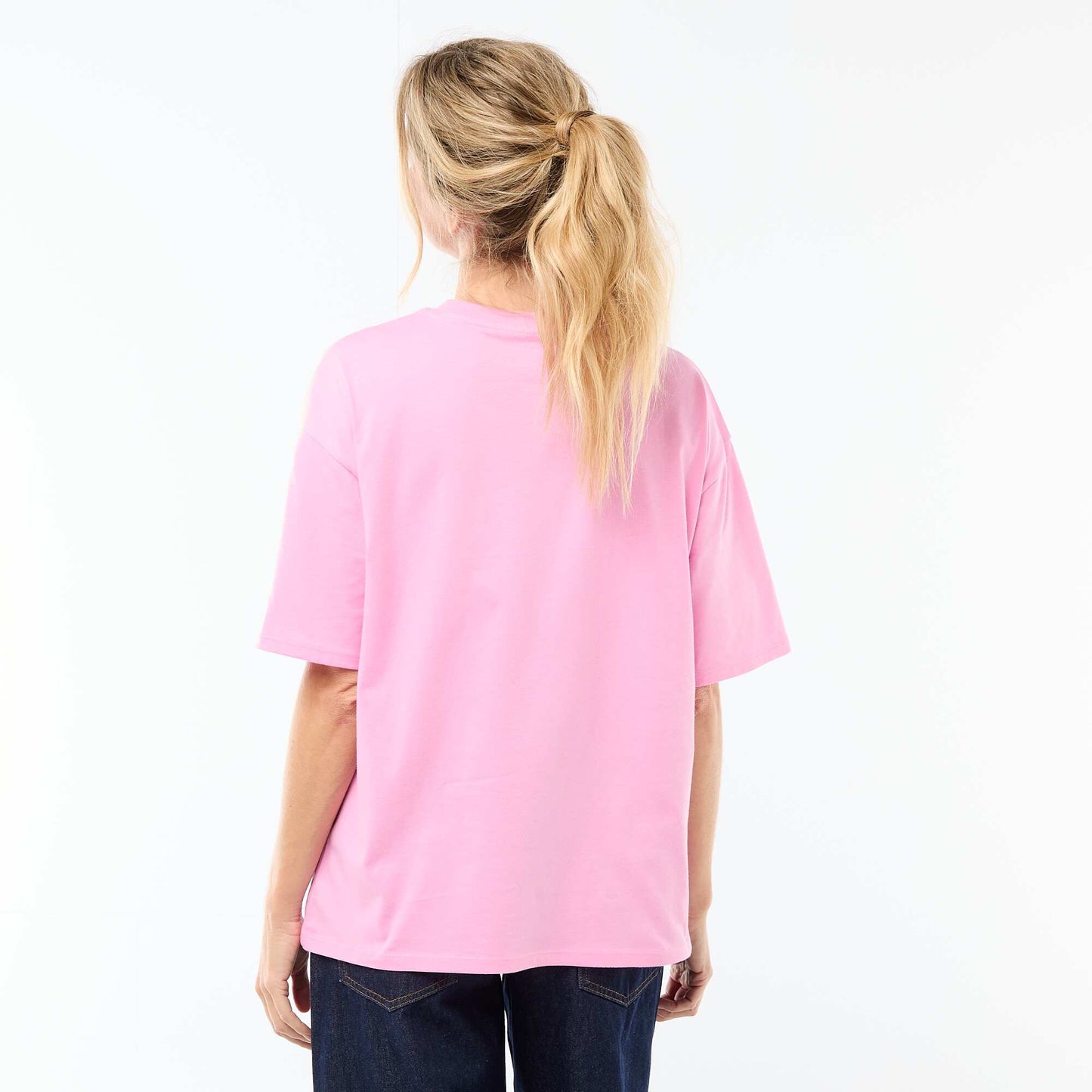 Camiseta oversize con mensaje ROSA