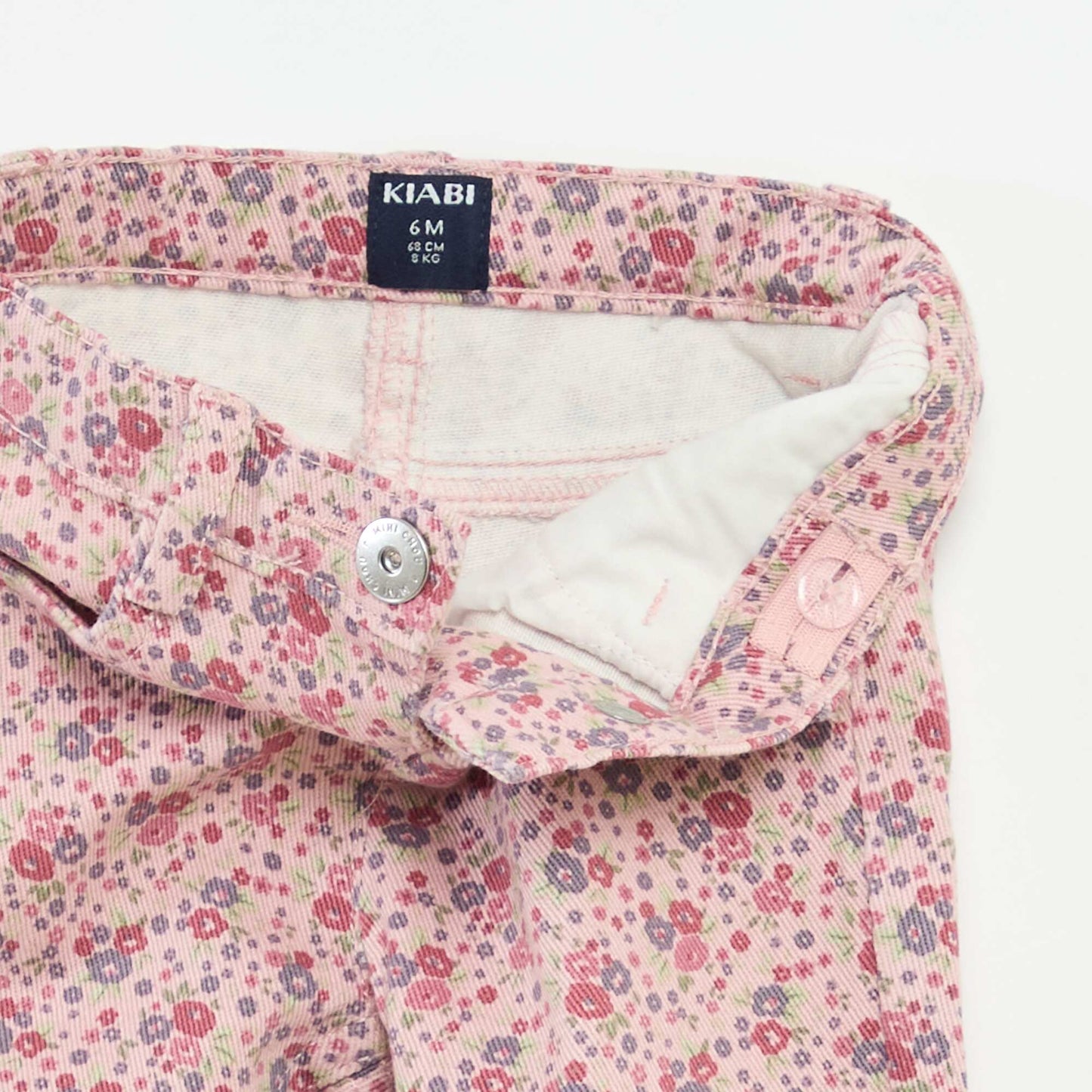 Jean slim con estampado floral PURPURA