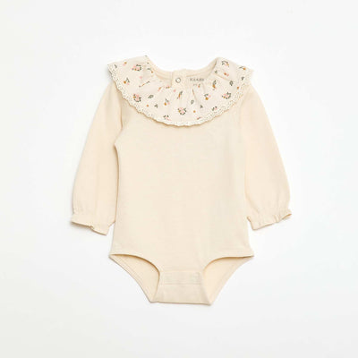 Body liso con cuello Claudine estampado BLANCO