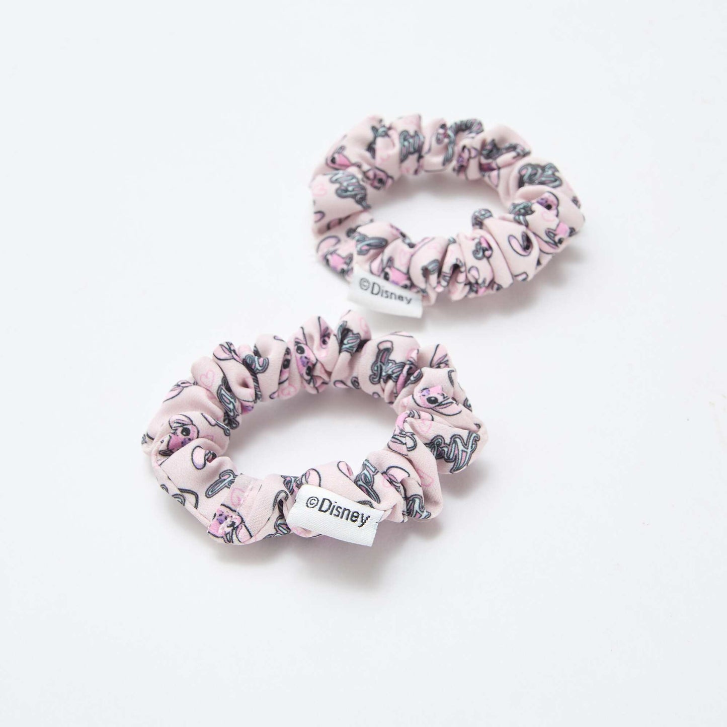 Lote de 4 pinzas + 2 gomas de pelo 'Stitch' ROSA