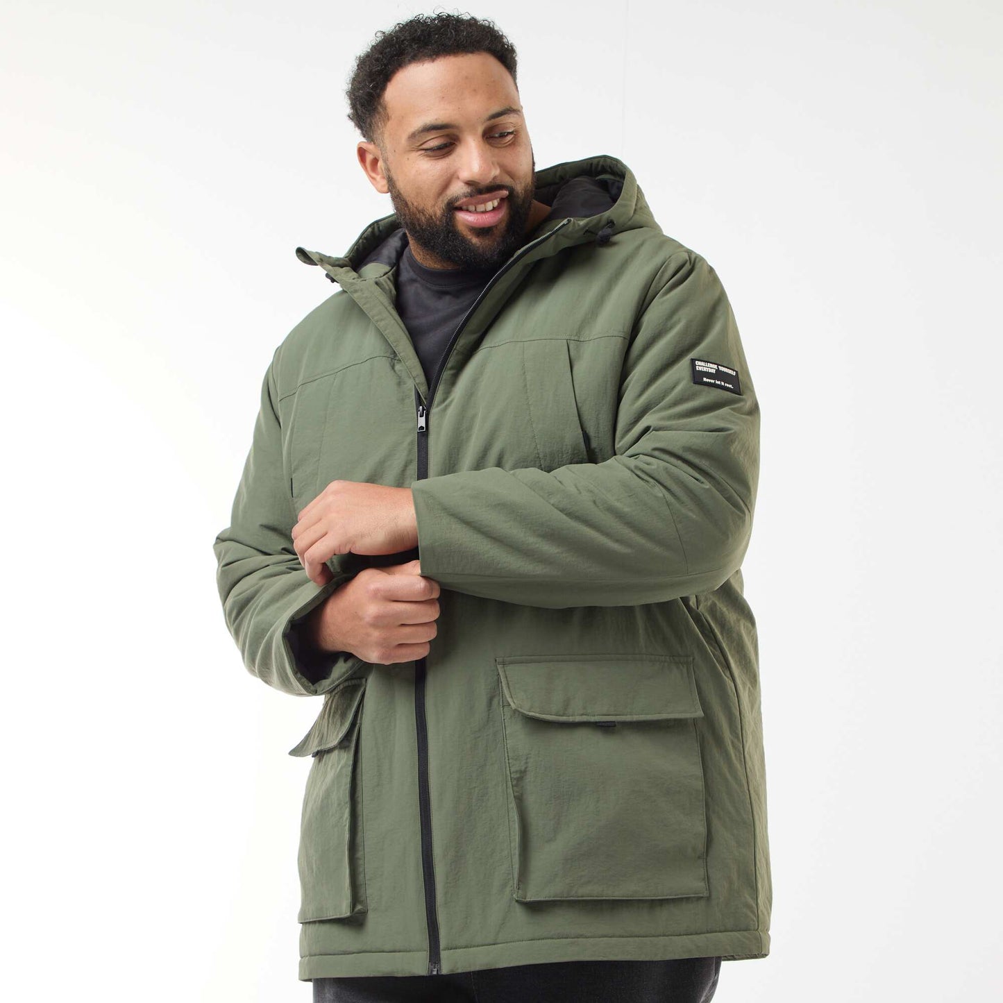Parka con capucha y bolsillos de parche con doble entrada y forro polar VERDE