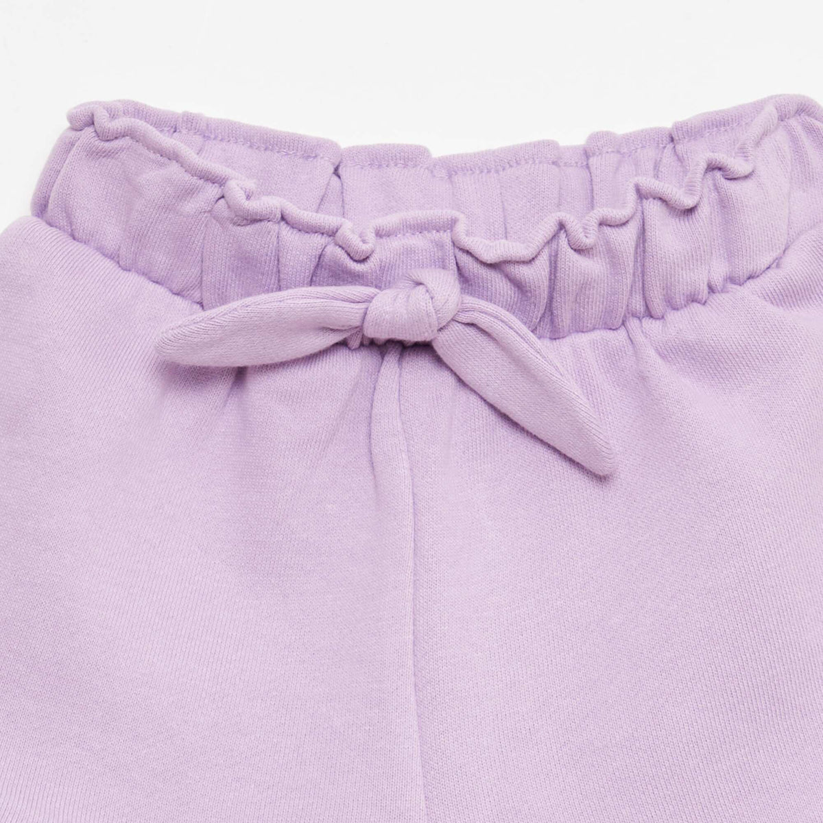 Pantalón corto con volantes y lazo en la cintura PURPURA