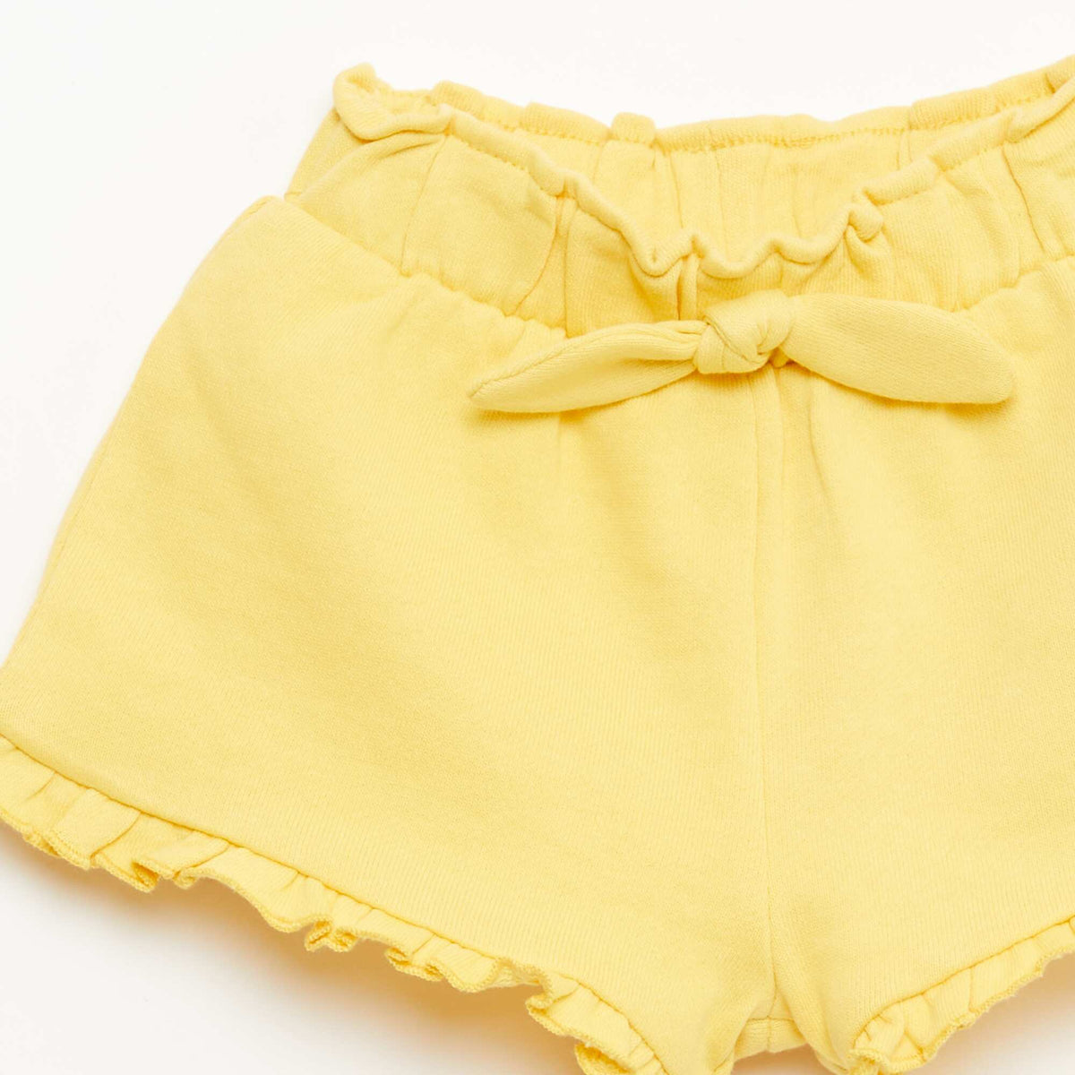 Pantalón corto con volantes y lazo en la cintura AMARILLO