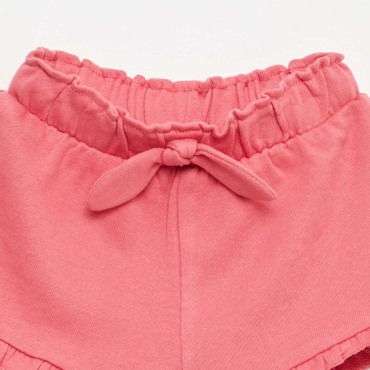 Pantalón corto con volantes y lazo en la cintura FUCSIA