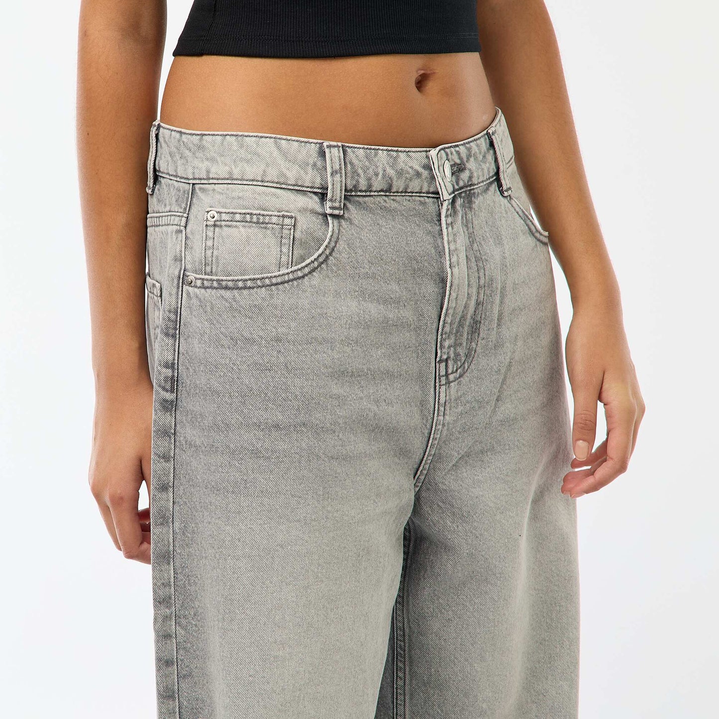 Jean baggy de tiro bajo con 5 bolsillos GRIS