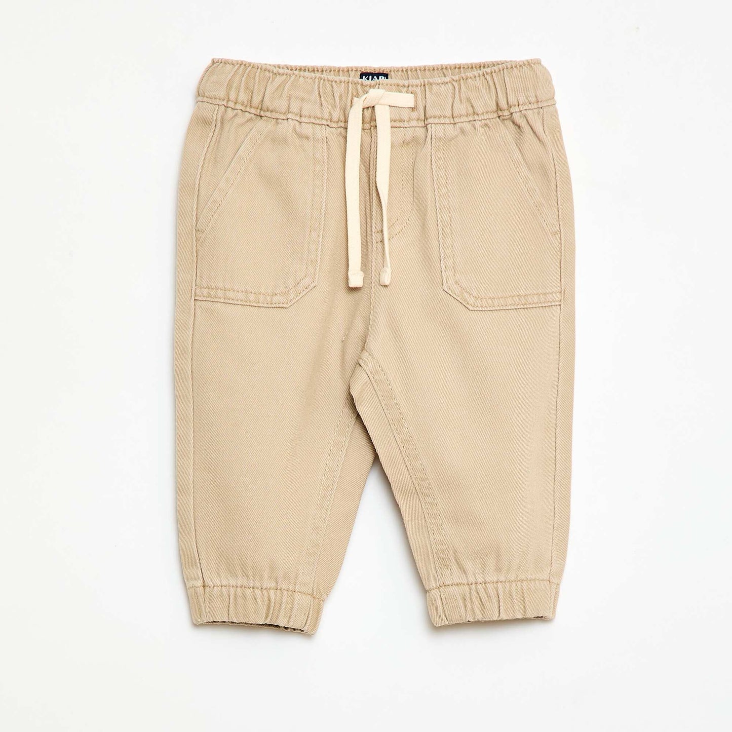 Pantalón liso corte relax fit BEIGE