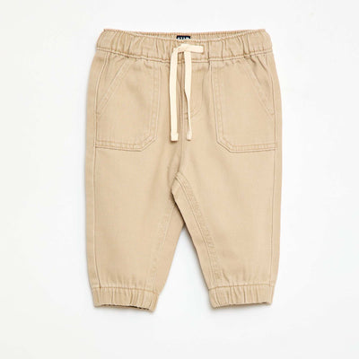 Pantalón liso corte relax fit BEIGE