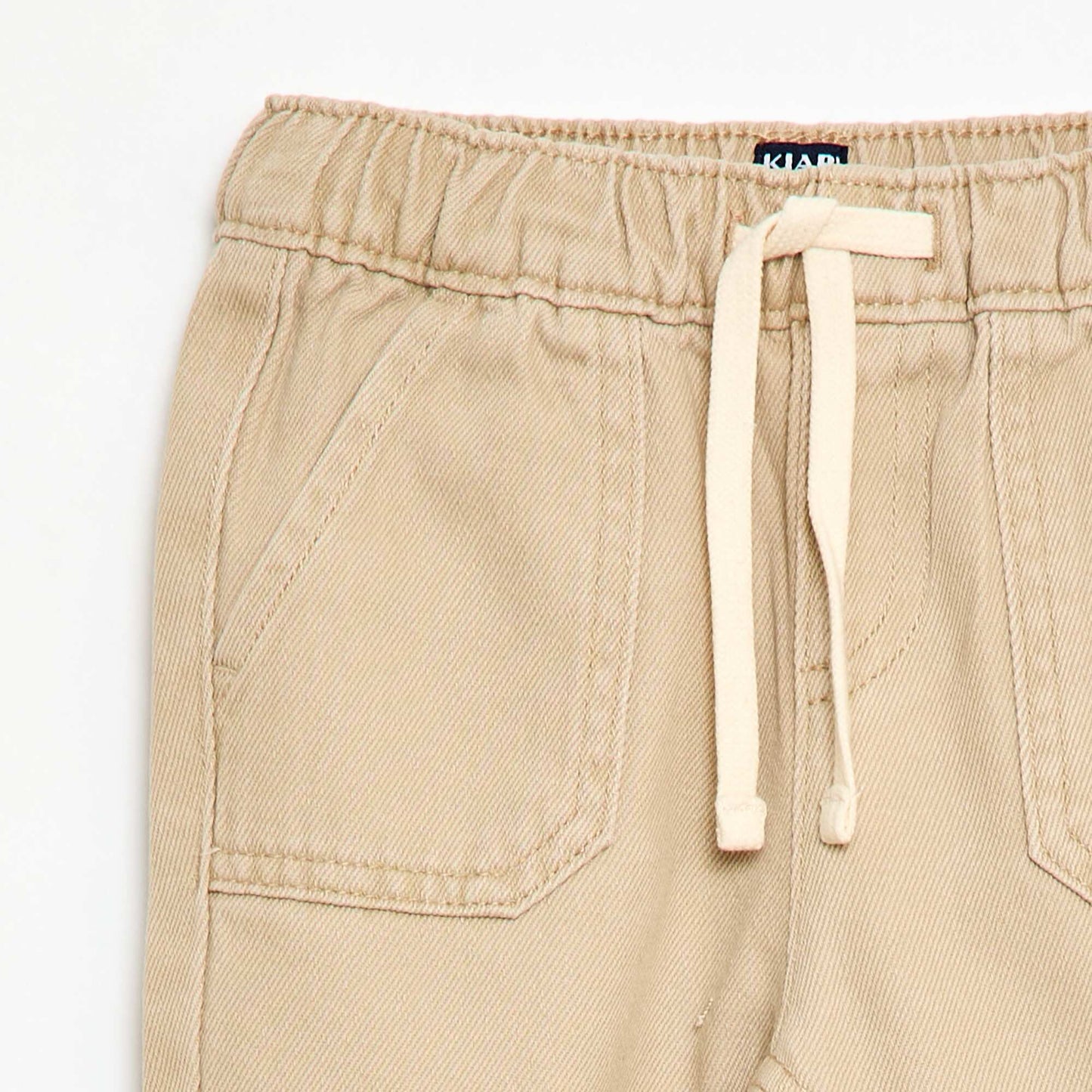 Pantalón liso corte relax fit BEIGE