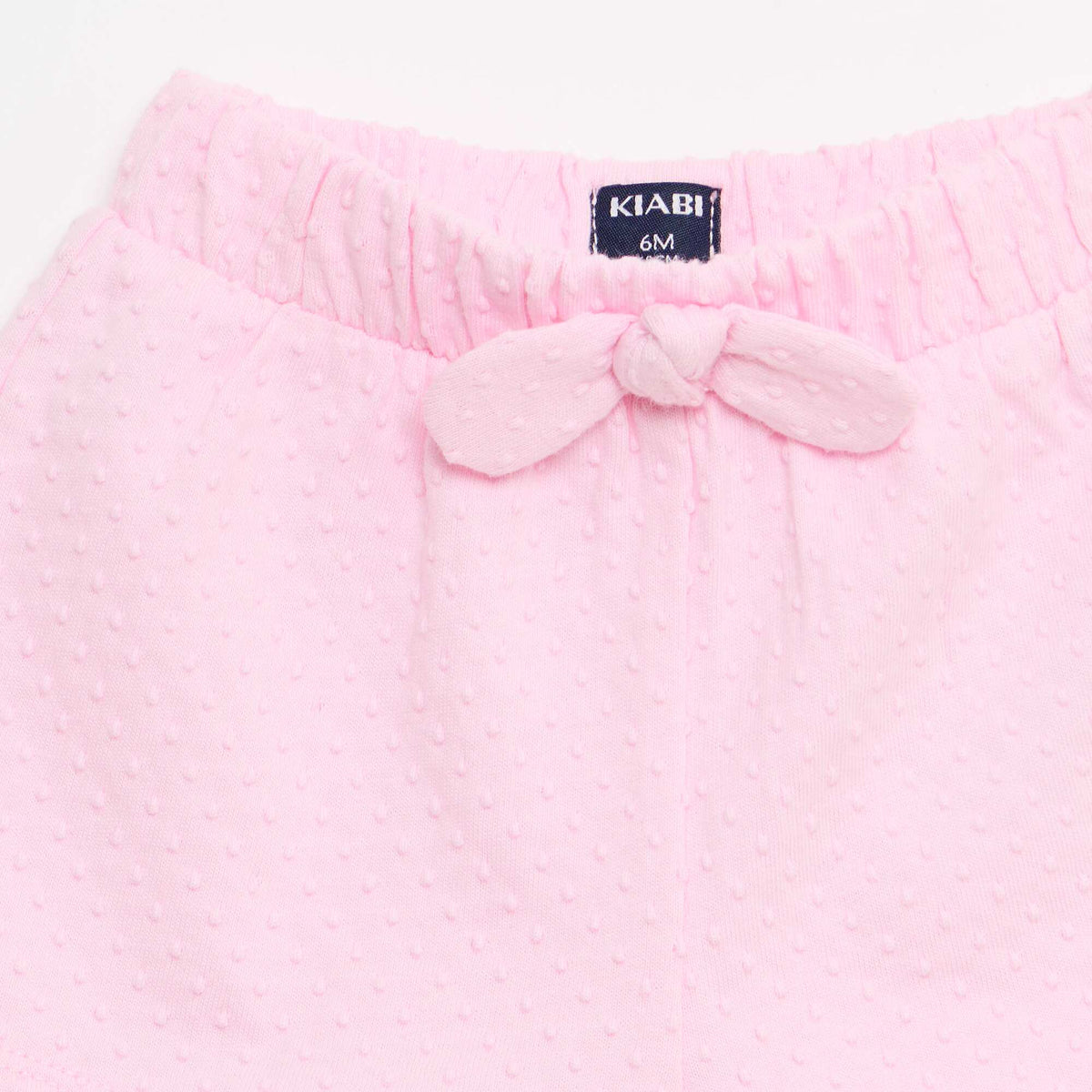 Pantalón corto de punto jacquard liso con lazo de fantasía ROSA