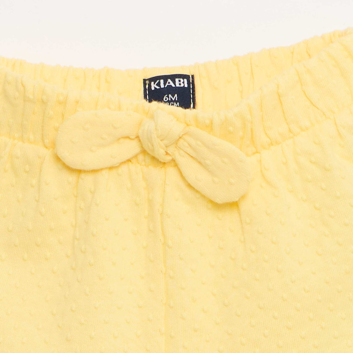 Pantalón corto de punto jacquard liso con lazo de fantasía AMARILLO