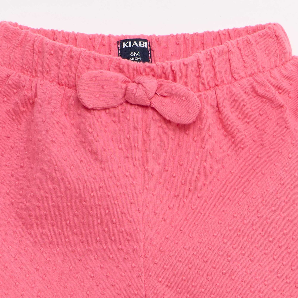 Pantalón corto de punto jacquard liso con lazo de fantasía ROSA