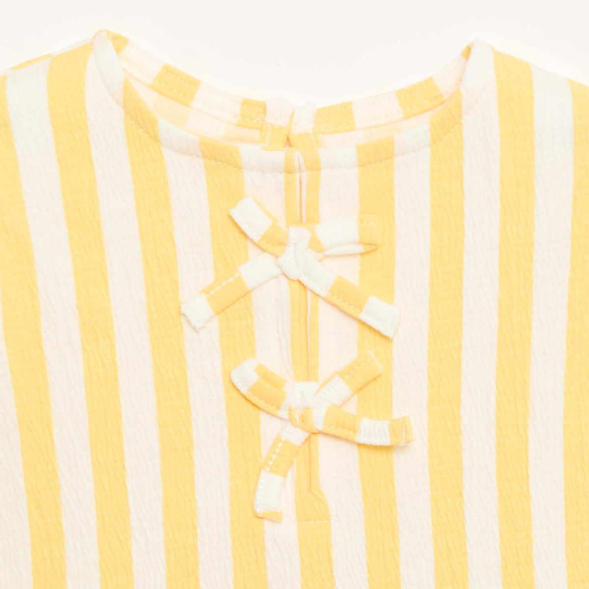 Camiseta estampada y con volantes AMARILLO