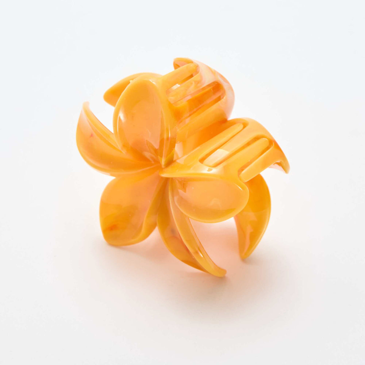 Pinza estilo flor de tiaré NARANJA