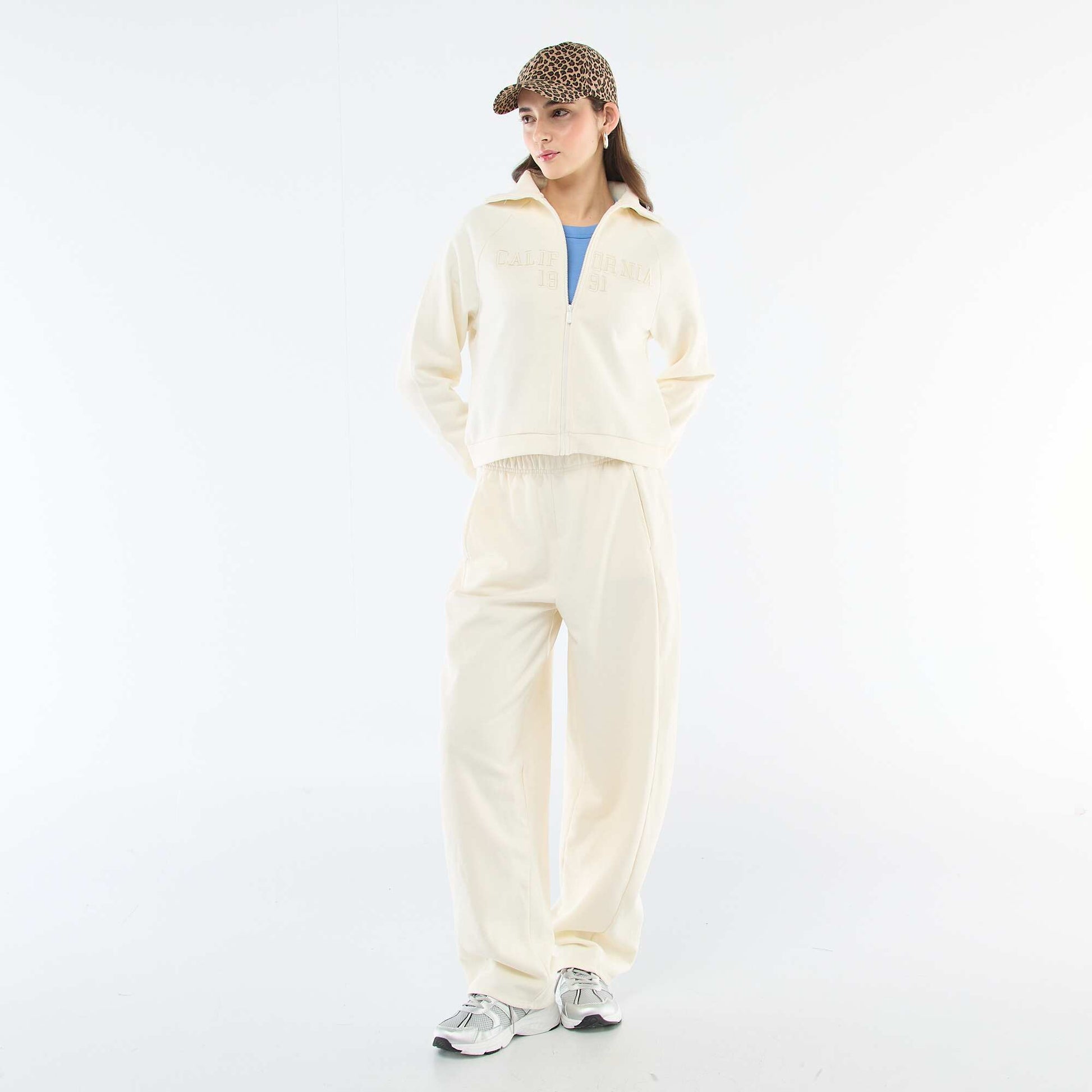 Buzo corta con cremallera y mensaje bordado BEIGE