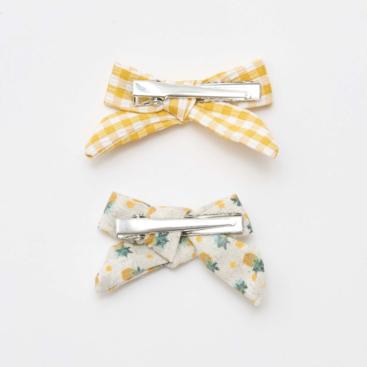 Pack de 2 pinzas de cocodrilo con lazos AMARILLO