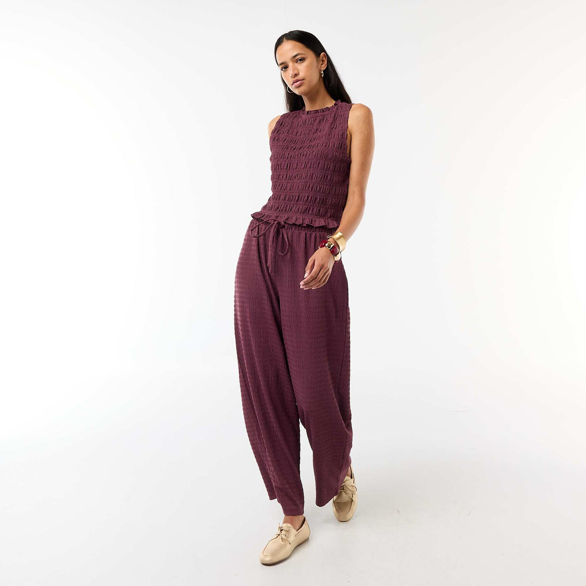 Pantalón ancho de punto smock PURPURA