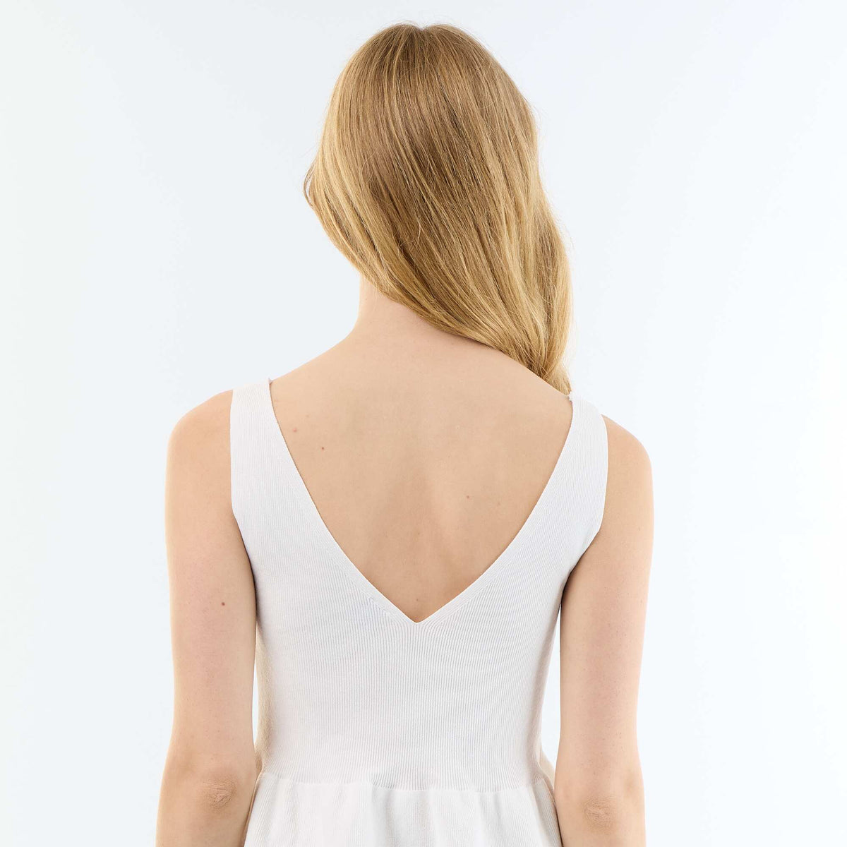 Top sin mangas peplum de canalé BLANCO