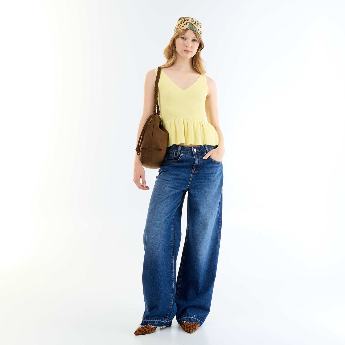 Top sin mangas peplum de canalé AMARILLO
