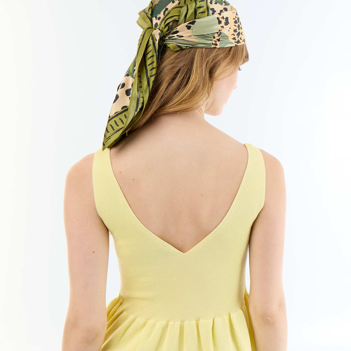 Top sin mangas peplum de canalé AMARILLO